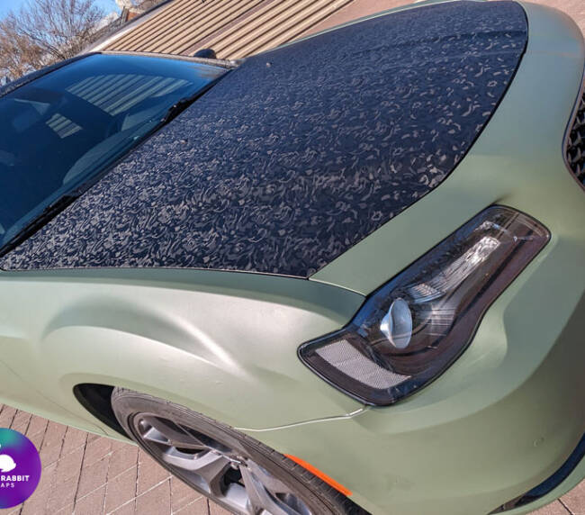 Chrysler 300 car wrap with matte military green and shadow black